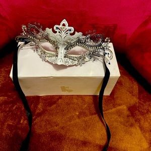 Condition: Very Good Used| Metal Mask with Ribbon Tie| Secure Fit